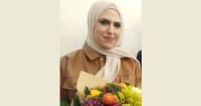الاديبة نورهان اللبن توقع روايتها الثانية في صور 
